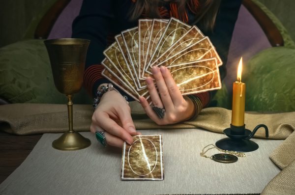 fortune teller with tarot cards
